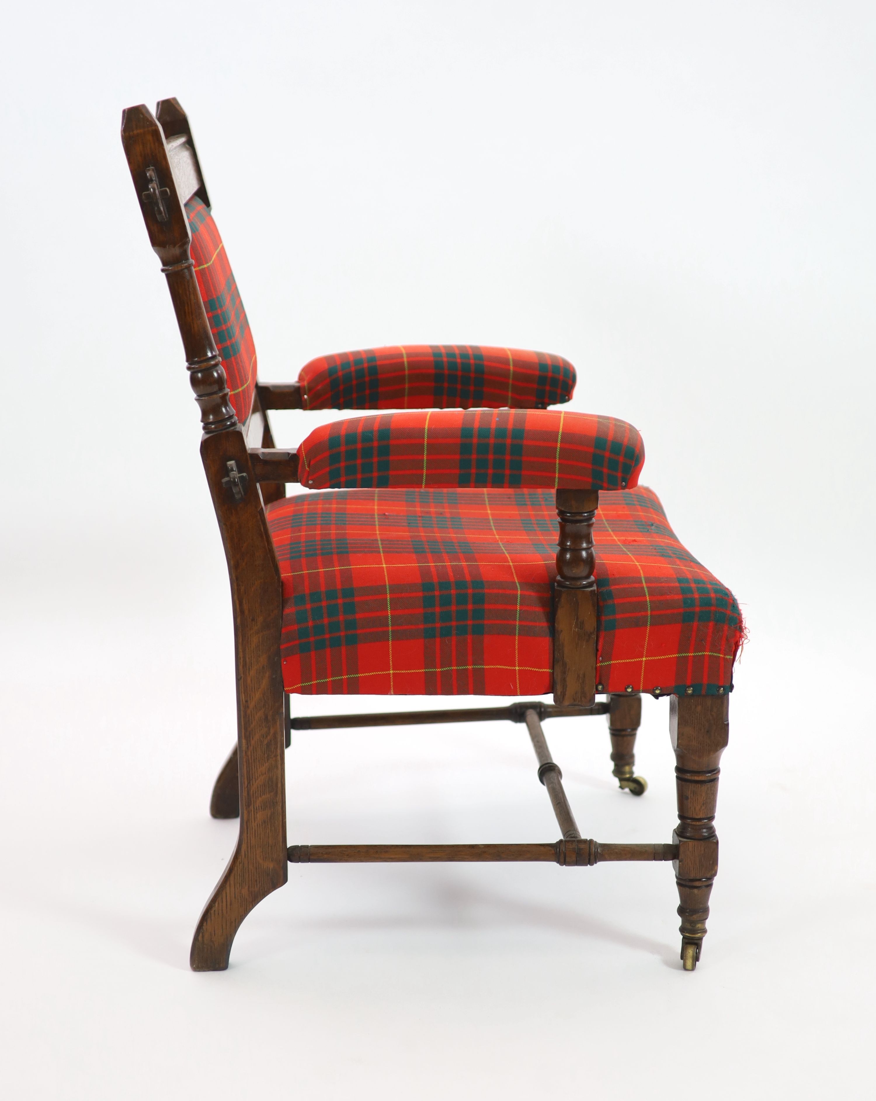 Royal Furniture - a Victorian Aesthetic movement oak open armchair W.66cm D.66cm H.100cm